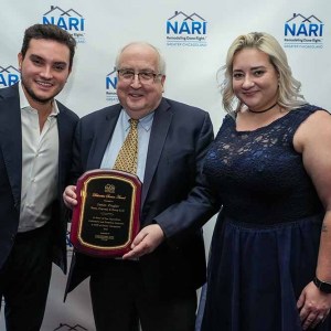 Jim-Ziegler-with-Trohphy-for-Presidents-Distinctive-Service-Award