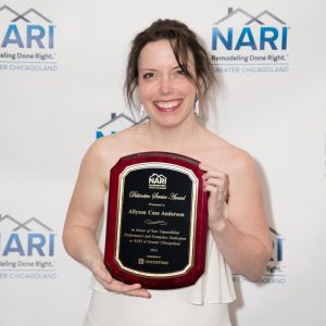 Ally-posing-with-Distinctive-Service-Award-close-up