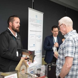Rockwool-Expo-table-with-guest